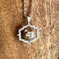 Back detail of Palm Tree Beach Globe necklace