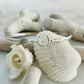 Silver bracelet on seashells